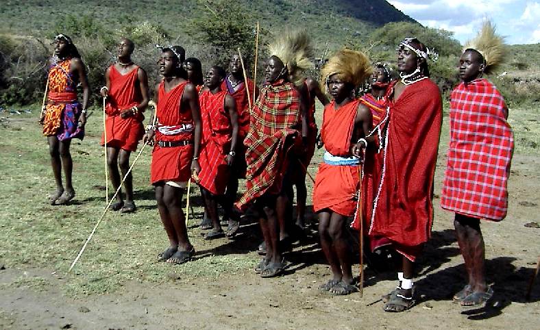 Maasai dancers performing a traditional jumping dance in Kenya